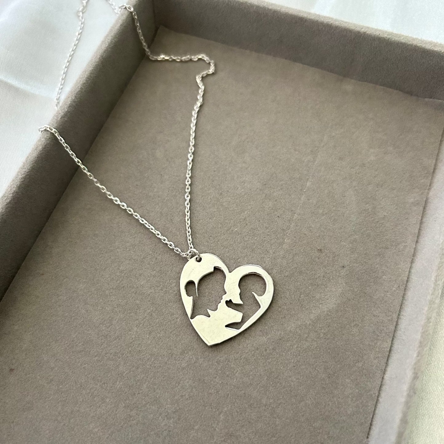 Mother holding kid with love Necklace in 925 Sterling Silver