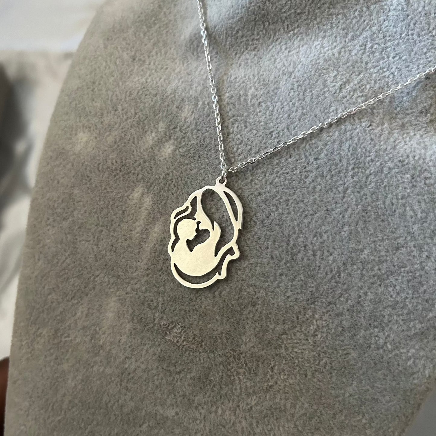 Mother Kissing Kid Necklace in 92.5 Sterling Silver